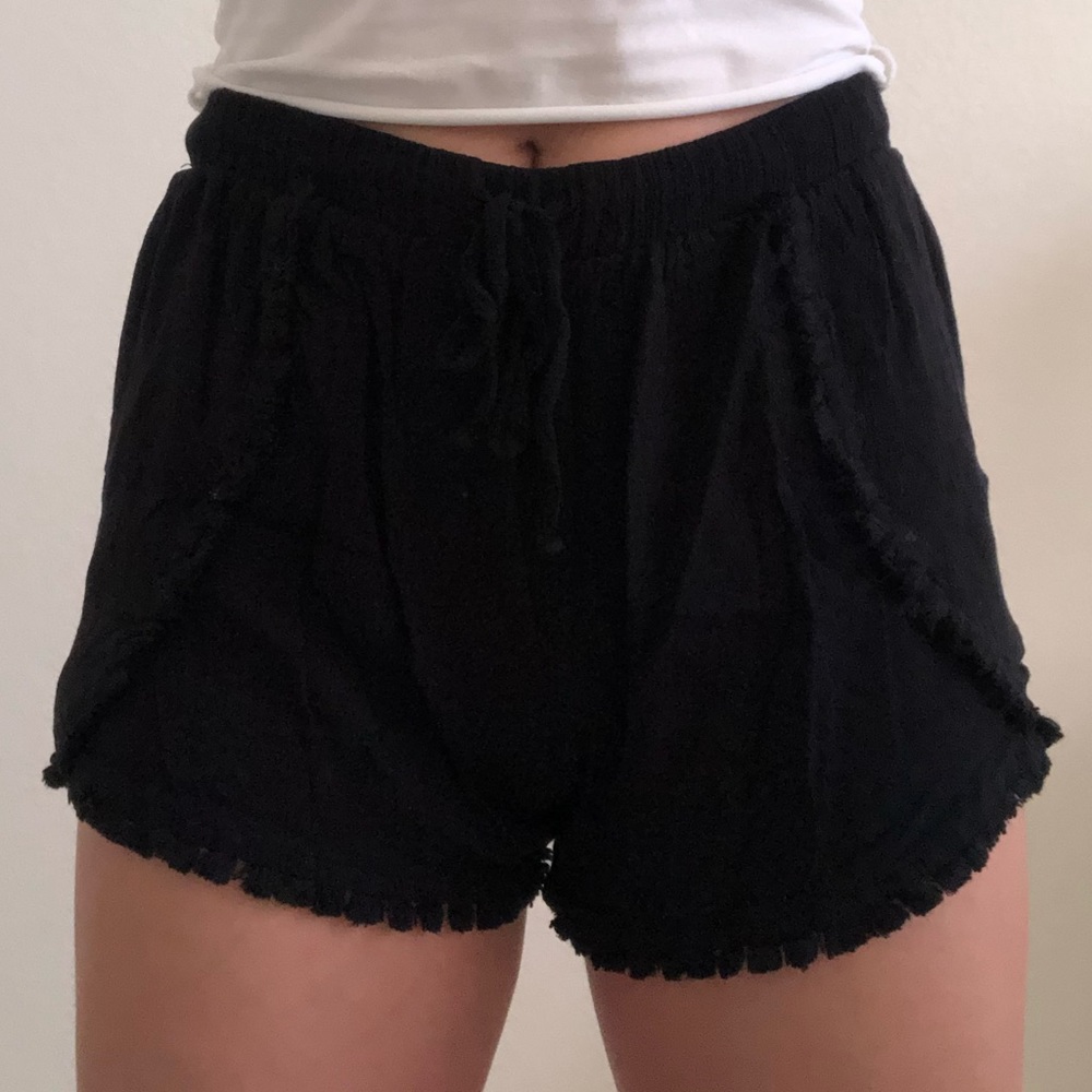 black flowy shorts with adjustable string.